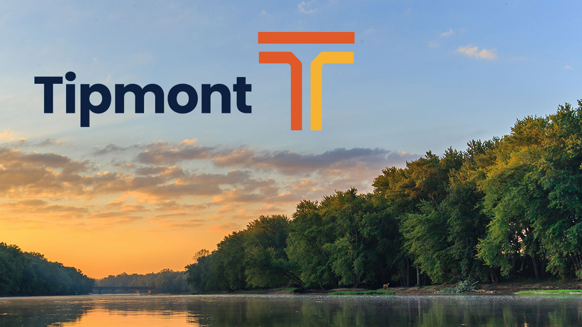 Tipmont logo over lake scene