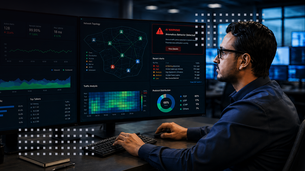 A cybersecurity analyst sits at a workstation, closely monitoring multiple large screens filled with data visualizations and threat alerts