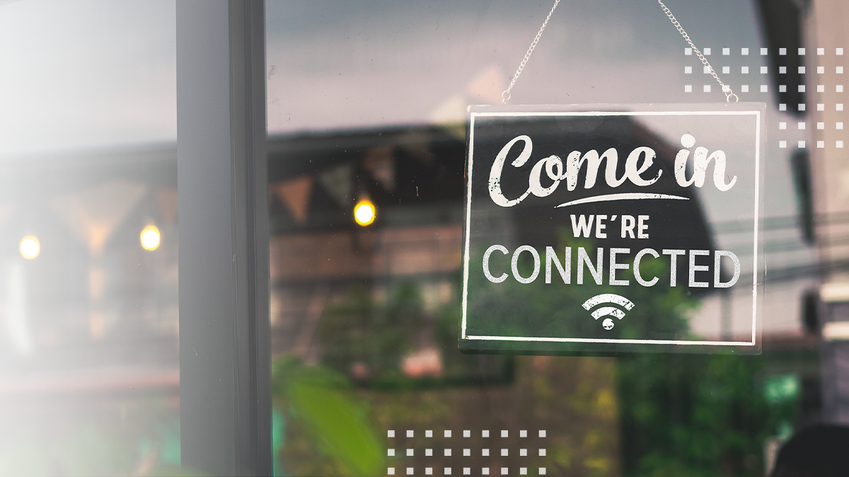 Come in we are connected, vintage black retro sign in glass door storefront
