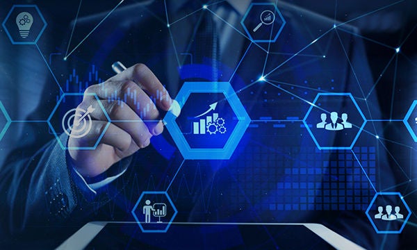 Business person hand touching sociotechnical system icon on virtual screen