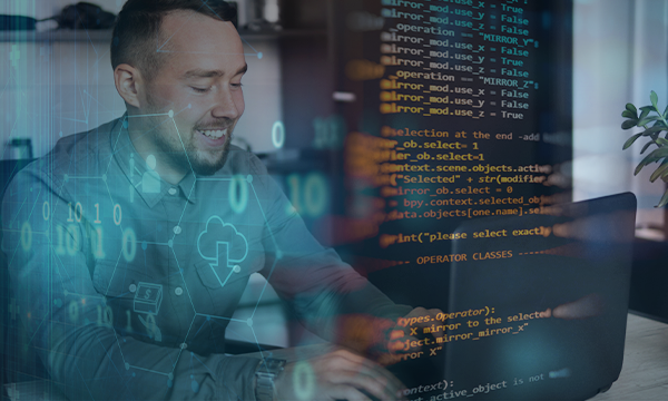 smiling software engineer with laptop working on the code in office