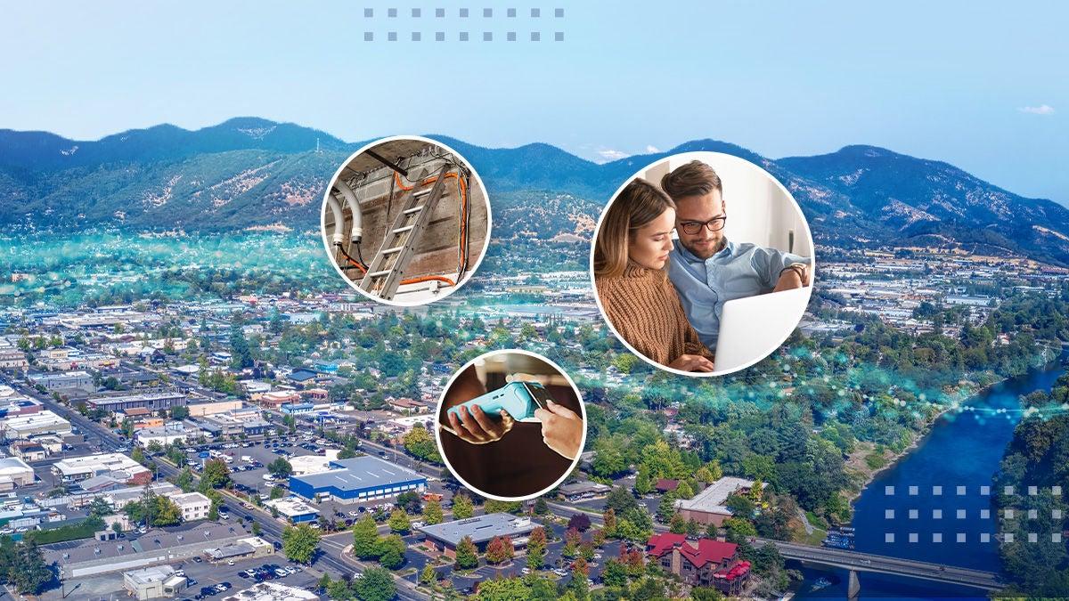 A press release graphic features the CalixOne and Consolidated Business Services names over an aerial view of a town surrounded by mountains. Circular insets show a technician working on infrastructure, a couple using a laptop together, and a person holding a smartphone. The layout emphasizes digital connectivity and modern communication services. Bold text reading "PRESS RELEASE" appears prominently in a blue box.