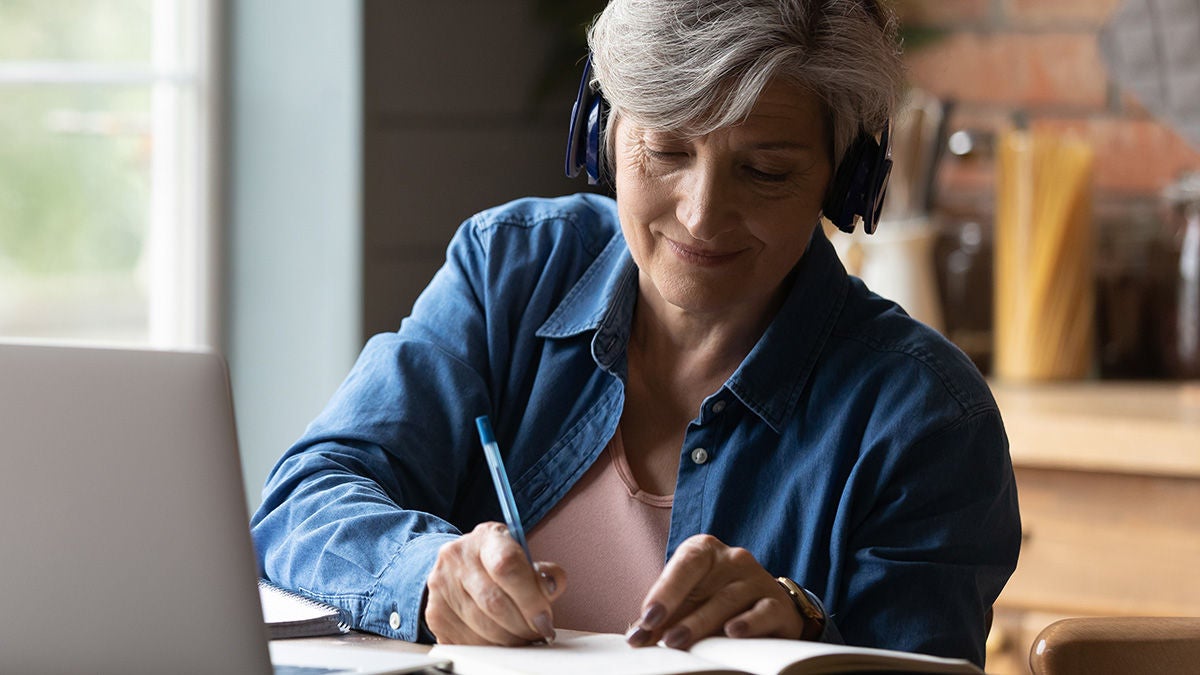 woman on computer learning