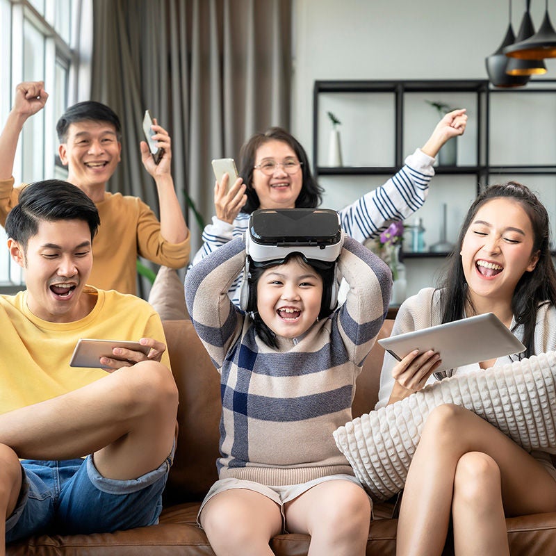 Smiling subscribers using electronic devices