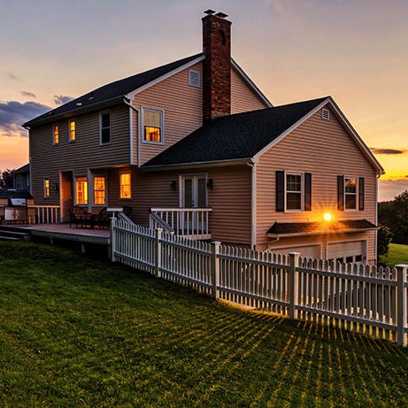 large home exterior at sunset