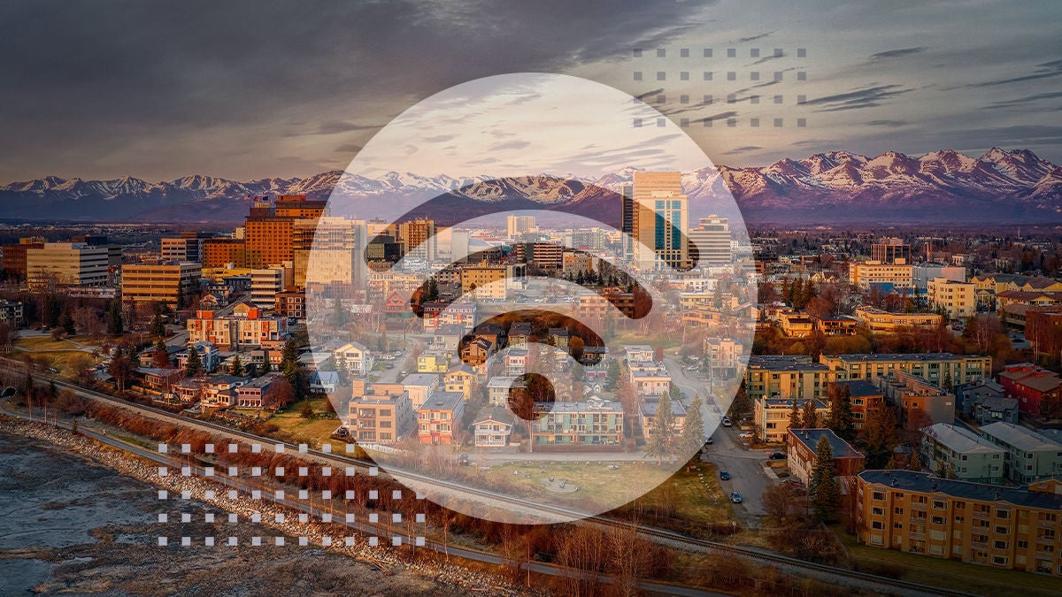 vibrant cityscape is shown at sunset with a large Wi-Fi symbol