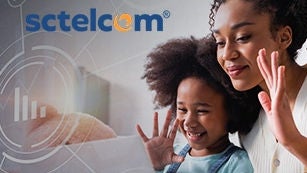 Mother and daughter waving on computer with sctelcom logo
