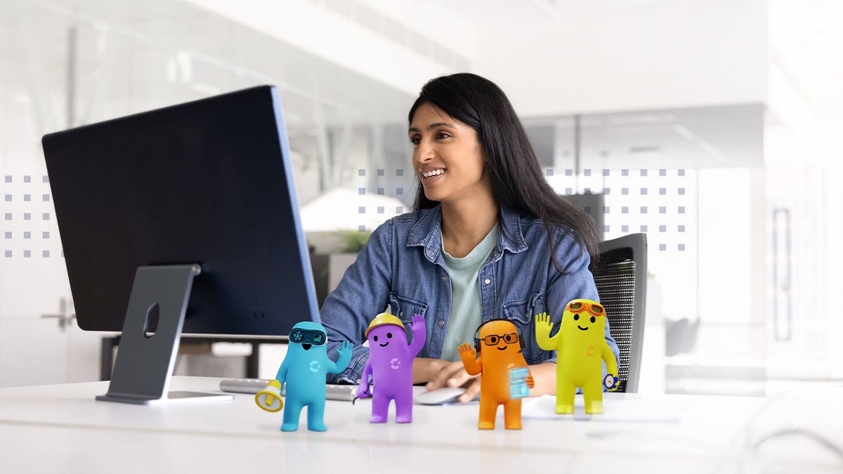 A woman sits at a modern office desk working on a desktop computer. In front of the monitor are four colorful cartoon characters wearing sunglasses, adding a playful element to the workspace. The text 'Agent Workforce' appears at the top left, while 'PRESS RELEASE' is highlighted in a blue banner at the bottom left. The word 'Calix' is visible at the bottom right, indicating the company associated with the announcement.