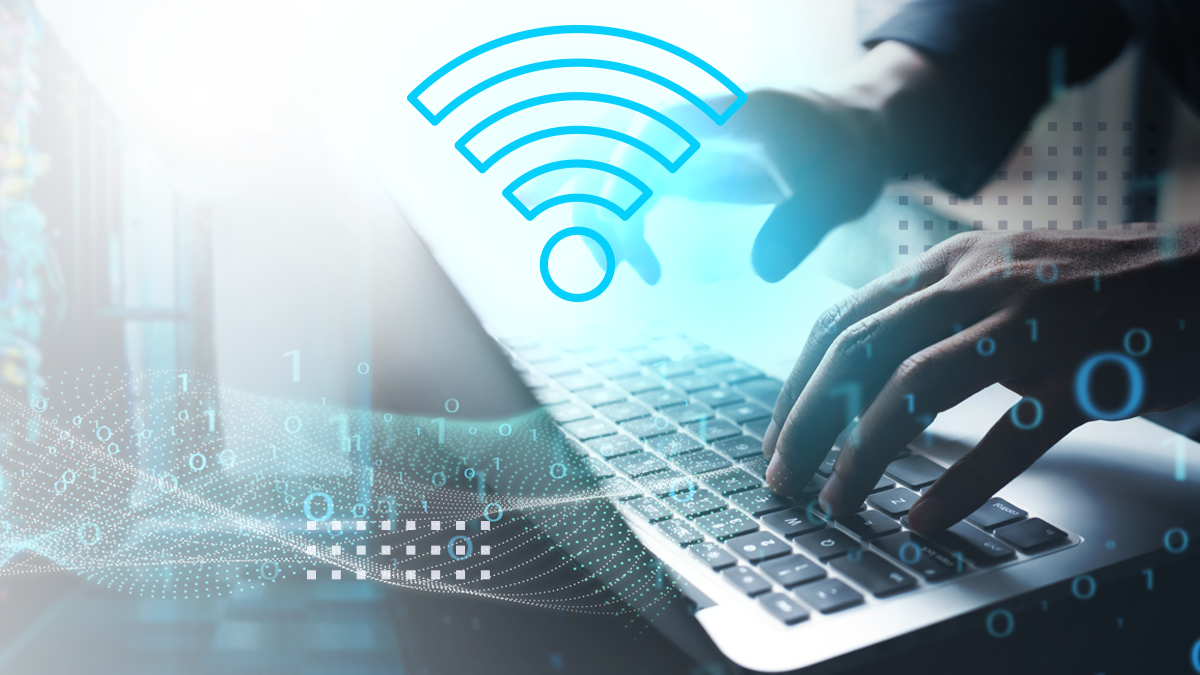 A person typing on a laptop with abstract data icons and a large Wi-fi symbol overlaid