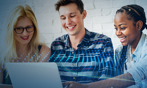 three colleagues working together on a laptop
