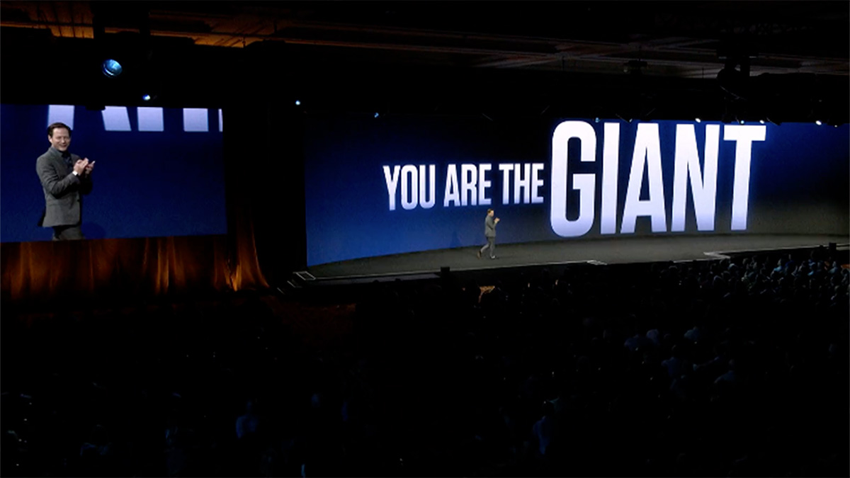 Stage with "You are the giant" on screen