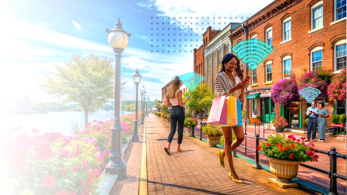 Multiethnic people using the secured public wifi network over the smart devices at the shopping center