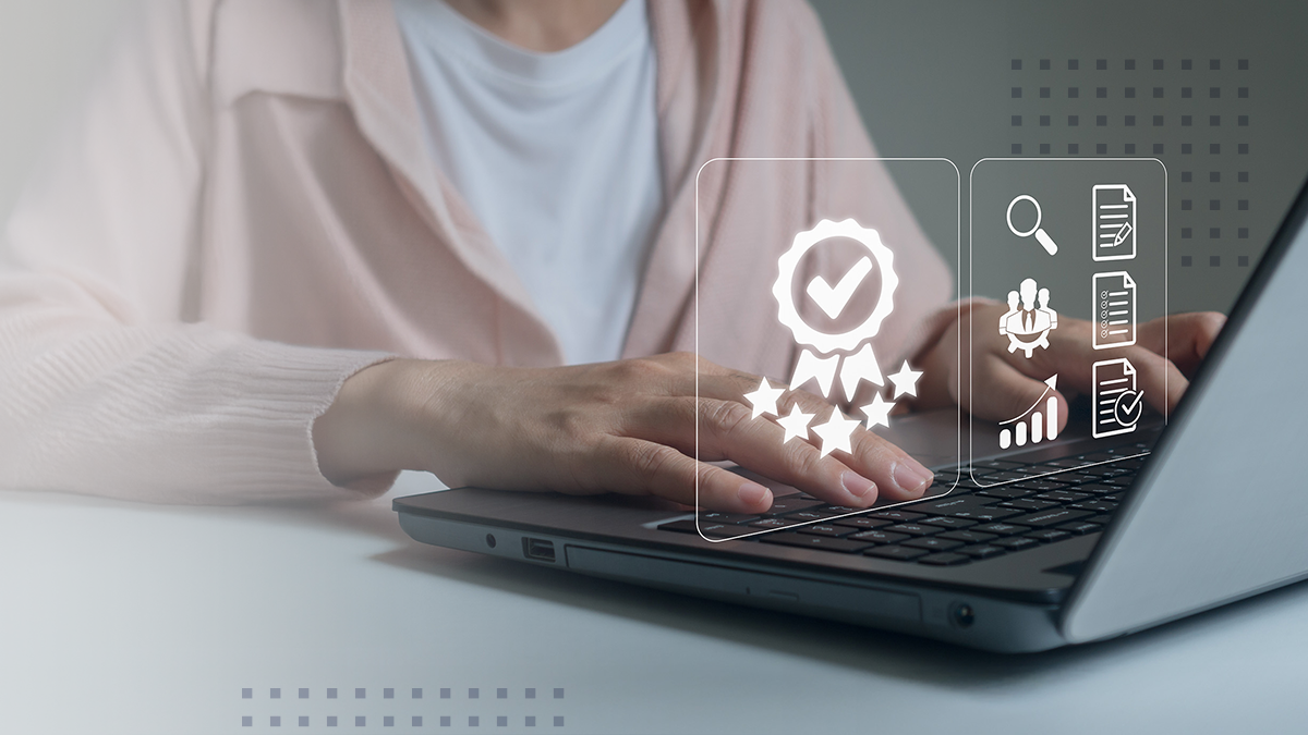 Businesswoman using laptop computer with quality assurance and document icon for ISO or International Standard Organisation which related quality control and continuous improvement concept